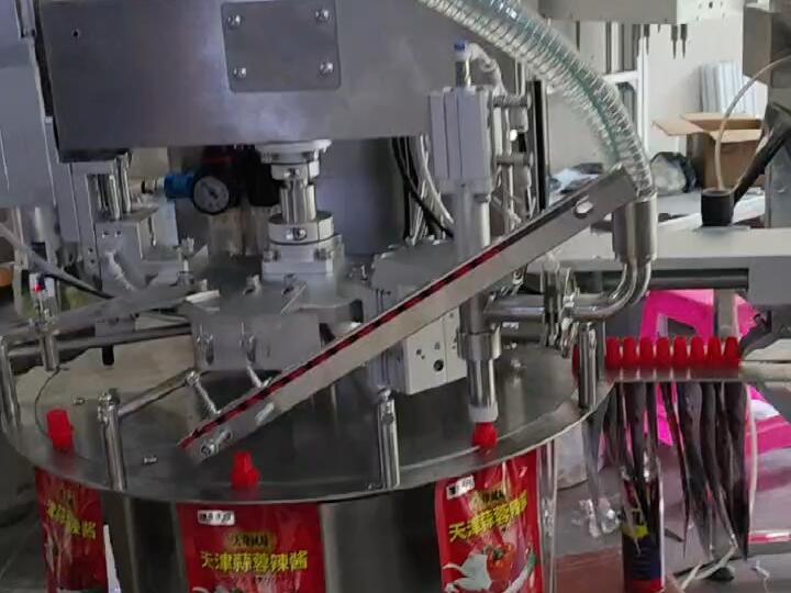 吸嘴袋灌装机与封口机联动调试
